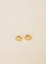 The Small Channel Gold Hoop earrings feature a twisted 18K gold plated design with sterling silver posts, shown on a simple light background.