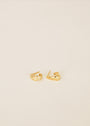 A pair of Small Ripple Gold Hoop earrings with 18K gold plating and sterling silver posts, shown on a plain, light-colored background.