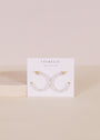 Multi Pearl Hoop Earrings featuring freshwater pearl beads and gold accents, displayed on a white JaxKelly card reading "WEAR GOOD VIBES" against a soft beige background.