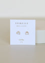 The White Opal Double Stud Stack features gold-framed white opal studs with 18k gold plating, displayed on a white JaxKelly card printed in gold with "Wear Good Vibes," "OPAL," and "joy.