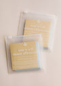 Each clear, reusable pouch contains a set of waterproof Note To Self Shower Affirmations™ cards in beige and blue—perfect for daily motivation in your shower.