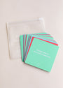 Teens Shower Affirmations™ features a stack of colorful affirmation cards for teens, with the top card reading "I bring value to the world around me," next to a translucent zippered pouch labeled “emotional showcase.” Perfect for daily inspiration.