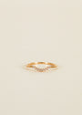 The Ring - Arched Crown - Champagne is a delicate, stackable V-shaped ring with small champagne cubic zirconia stones and 18k gold plating, shown on a plain light background.