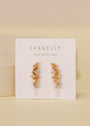 Gold plated Cascading Baguette Drop Earrings with small clear CZ stones are shown on a white JaxKelly Wear Good Vibes card against a soft beige background.