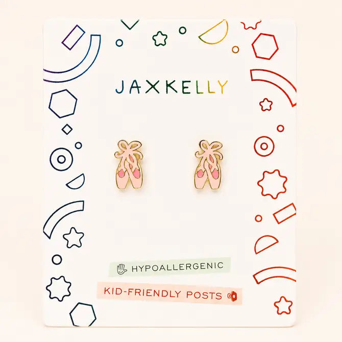 A pair of Ballet Slippers Enamel Flat Back Kids Earrings from JaxKelly, presented on a decorative card with colorful geometric designs and labeled hypoallergenic, feature kid-friendly posts perfect for sensitive ears—an ideal, stylish choice for any young dancer.