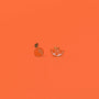Add a playful, fruity touch to any outfit with the Orange Enamel Flat Back Kids Earrings—one shaped like a whole orange with green leaves, the other as an orange slice. Hypoallergenic and perfect for sensitive ears.