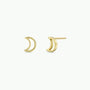 The Minimalist Moon earrings by JaxKelly are small, 18k gold-plated crescent moons with a hollow design, displayed against a plain white background.