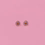 Donut Enamel Flat Back Kids Earrings—small, round hypoallergenic earrings resembling pink frosted donuts with sprinkles, shown on a solid pink background.