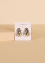 The Silver Bold Swirl - Earring is shown as a pair of sterling silver, ridged hoops on a white JaxKelly card with a beige background. These earrings feature a rounded, textured swirl design.
