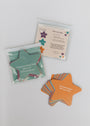 Kids Shower Affirmations™ are star-shaped, waterproof cards for kids with positive quotes like "I am special just the way I am," packaged in a clear pouch labeled Empowering Kids Shower Affirmations.