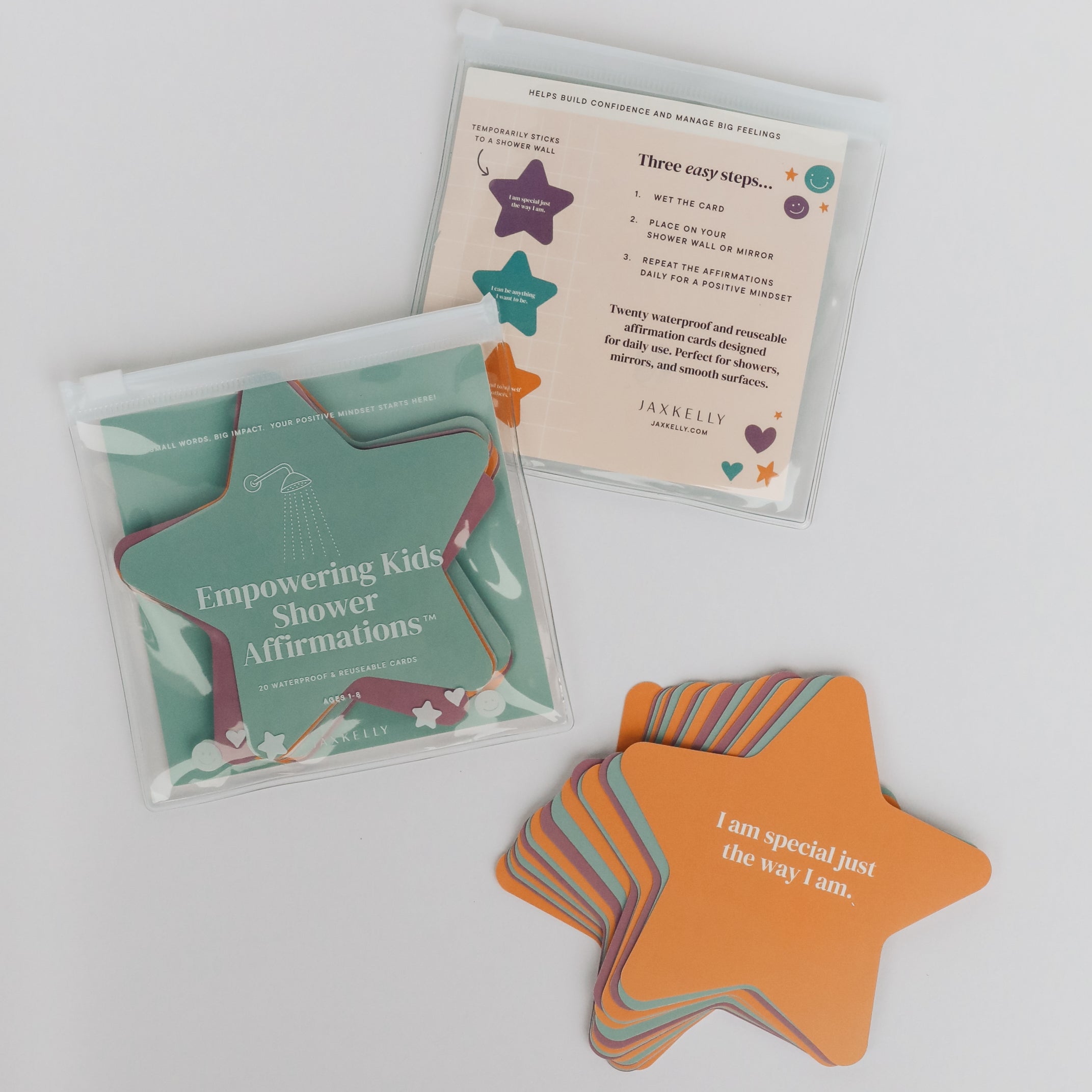 Kids Shower Affirmations™ are star-shaped, waterproof cards for kids with positive quotes like "I am special just the way I am," packaged in a clear pouch labeled Empowering Kids Shower Affirmations.