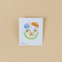 A card displays Bumble Bee Enamel Flat Back Kids Earrings with labels: Secure flat screw-back, surgical-grade stainless steel, 18K gold plated, nickel/lead/copper free on a beige background—perfect for sensitive ears.