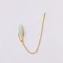 The JaxKelly Gemstone Threader - Amazonite showcases a delicate gold chain threader earring with a pale green Amazonite crystal pendant, secured by a gold loop and displayed on a plain white background.