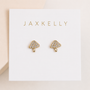 The Pavé Mushroom earrings by JaxKelly feature gold mushroom charms with small clear gemstones and sterling silver posts, displayed on a white card with "JaxKelly" in gold lettering.