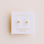 These Clear Quartz Mineral Point earrings by JaxKelly are displayed on a white card labeled "Cleansing"—a beautiful, tarnish-free jewelry choice for those seeking both style and positive energy.