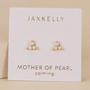 A pair of JaxKelly Trio Cluster Gold Earrings - Pearl featuring pearl-like beads and gold-plated accents, displayed on a white card.