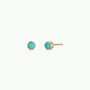The Simple Stud Earring - Turquoise Gemstone by JaxKelly features round turquoise stones in gold prongs, displayed on a plain white background—a perfect hypoallergenic option for everyday elegance.