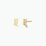 The Zodiac Earrings - Aquarius are small stud earrings shaped like the Aquarius symbol with 18k gold plating, ideal for ear piercings and displayed on a plain white background.