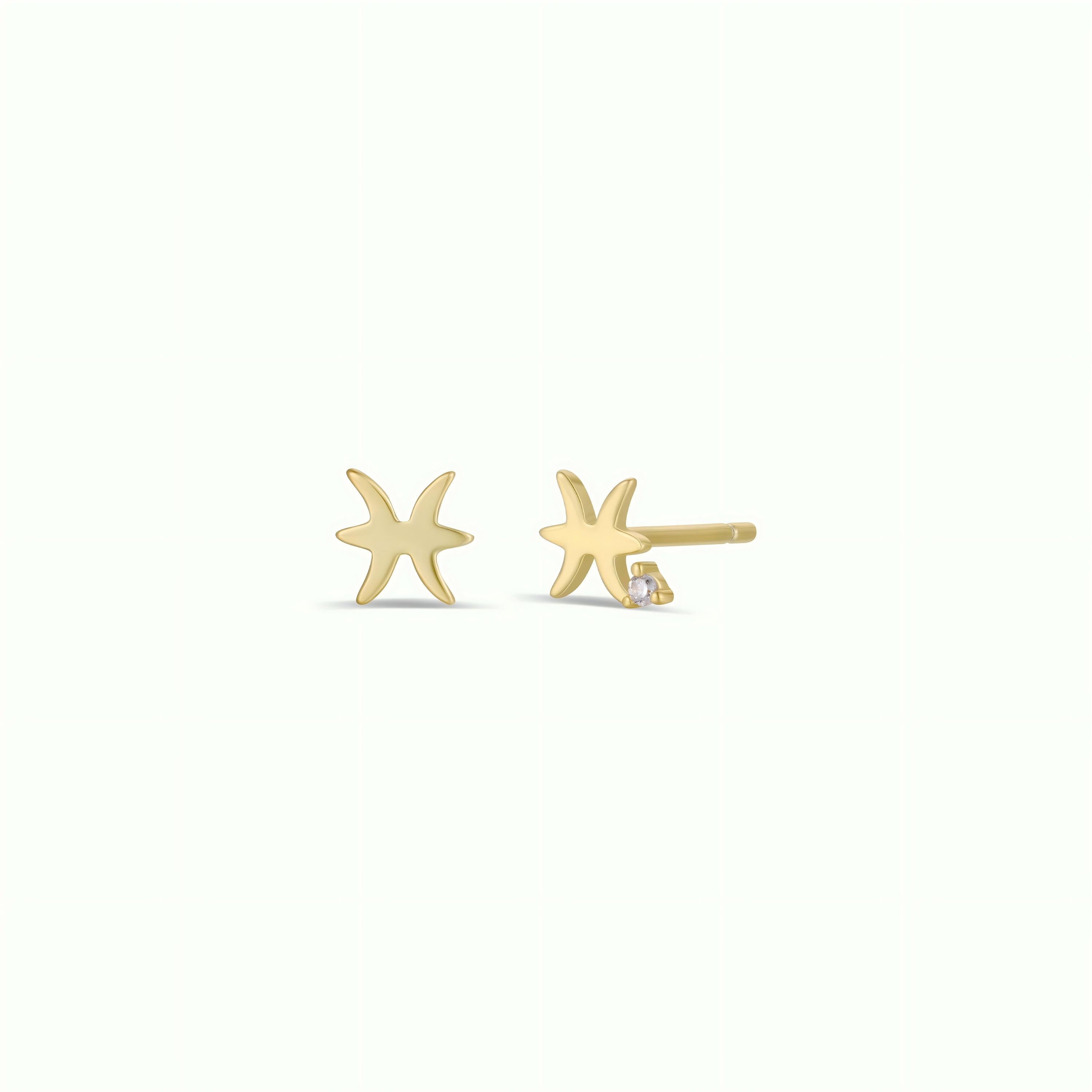 Zodiac Earrings - Pisces: 18k gold plated, six-point star studs displayed on a plain light background, with one earring shown from the front and the other from the side to reveal post and backing.