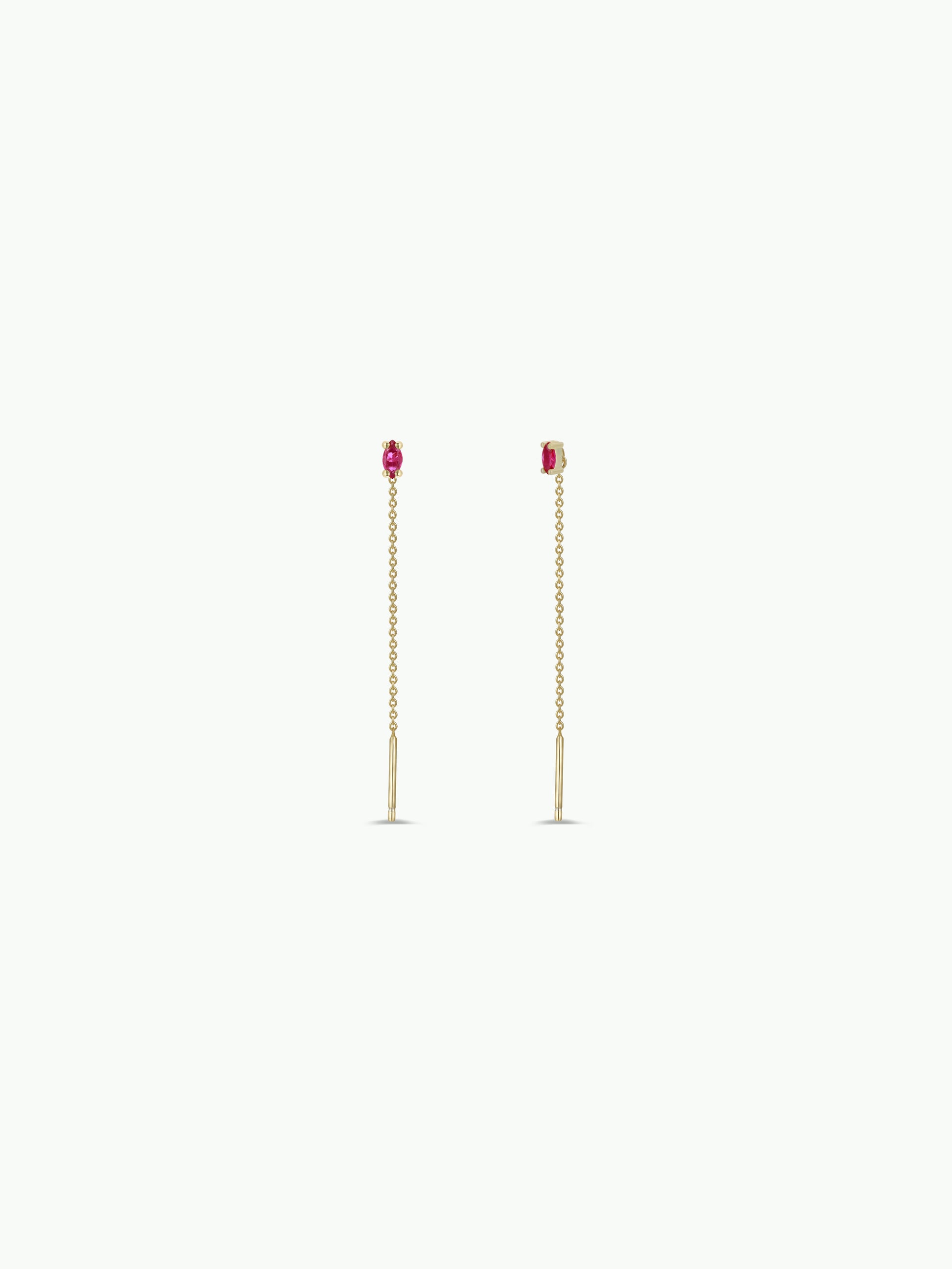 The JaxKelly Studded Threader - Pink CZ earrings feature 18K gold plating with a delicate chain and a small pink cubic zirconia stud, showcased against a plain white background.