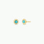 The Turquoise Sun Stud earrings feature sunburst-shaped gold studs, each with a round turquoise center and 18k gold plating, shown against a white background.