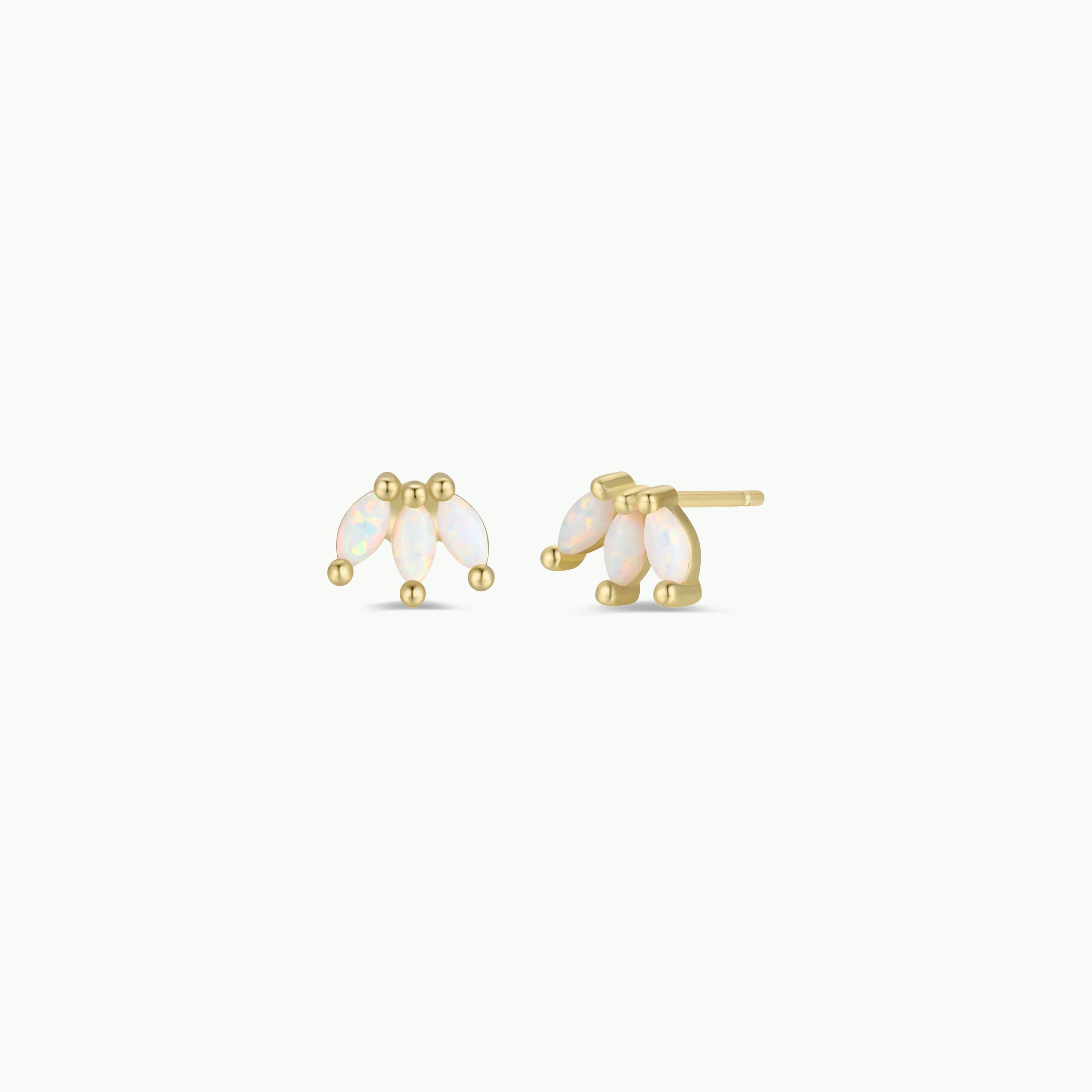 The White Opal Crown Stud earrings feature three small marquise-shaped lab-grown opal stones arranged in a cluster, displayed on a plain white background.