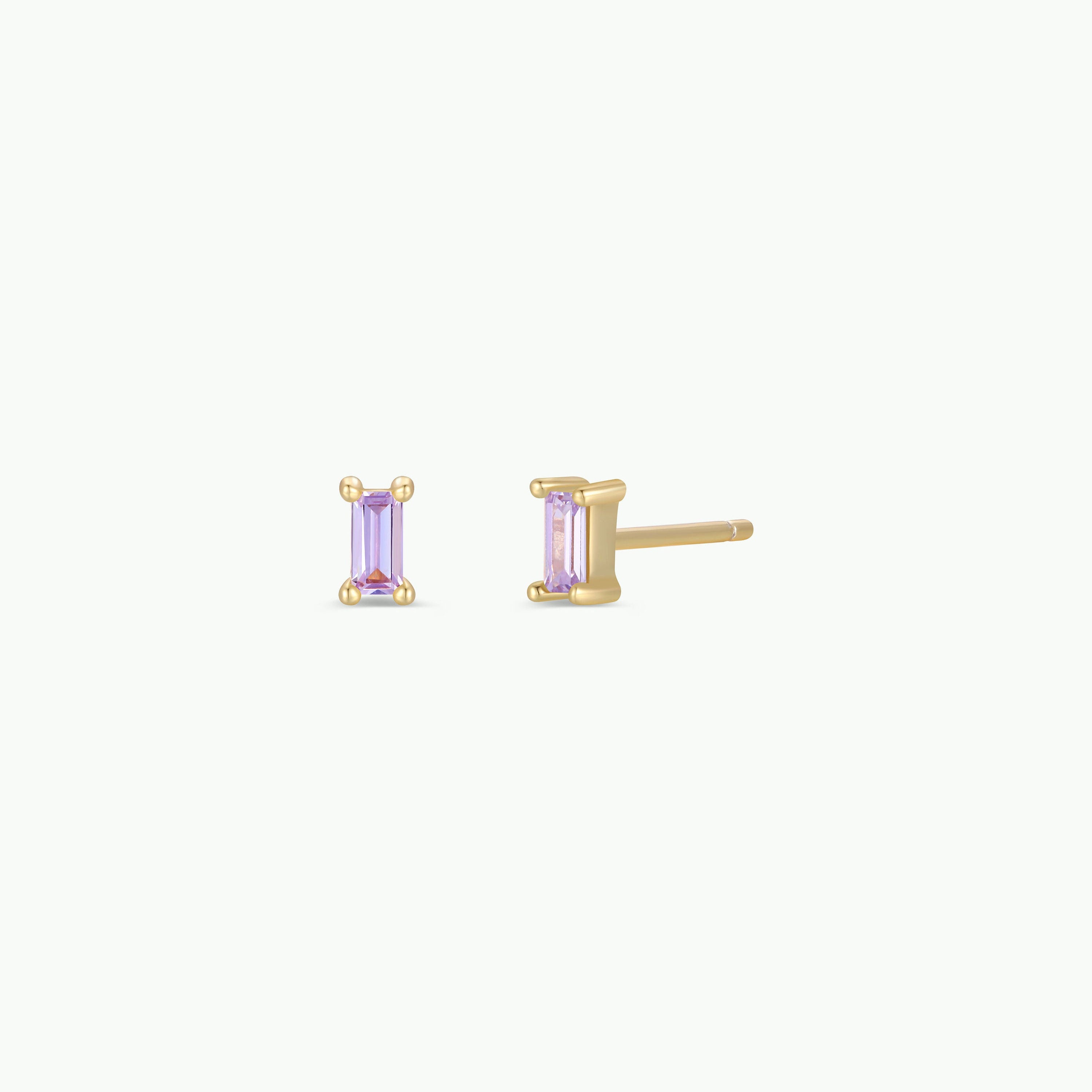 The Lilac Baguette earrings feature rectangular light purple gemstones set in 18k gold plating with sterling silver posts, shown against a plain white background.