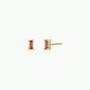 The Coffee Baguette features gold plated stud earrings with rectangular orange gemstones and sterling silver posts, shown on a plain white background.