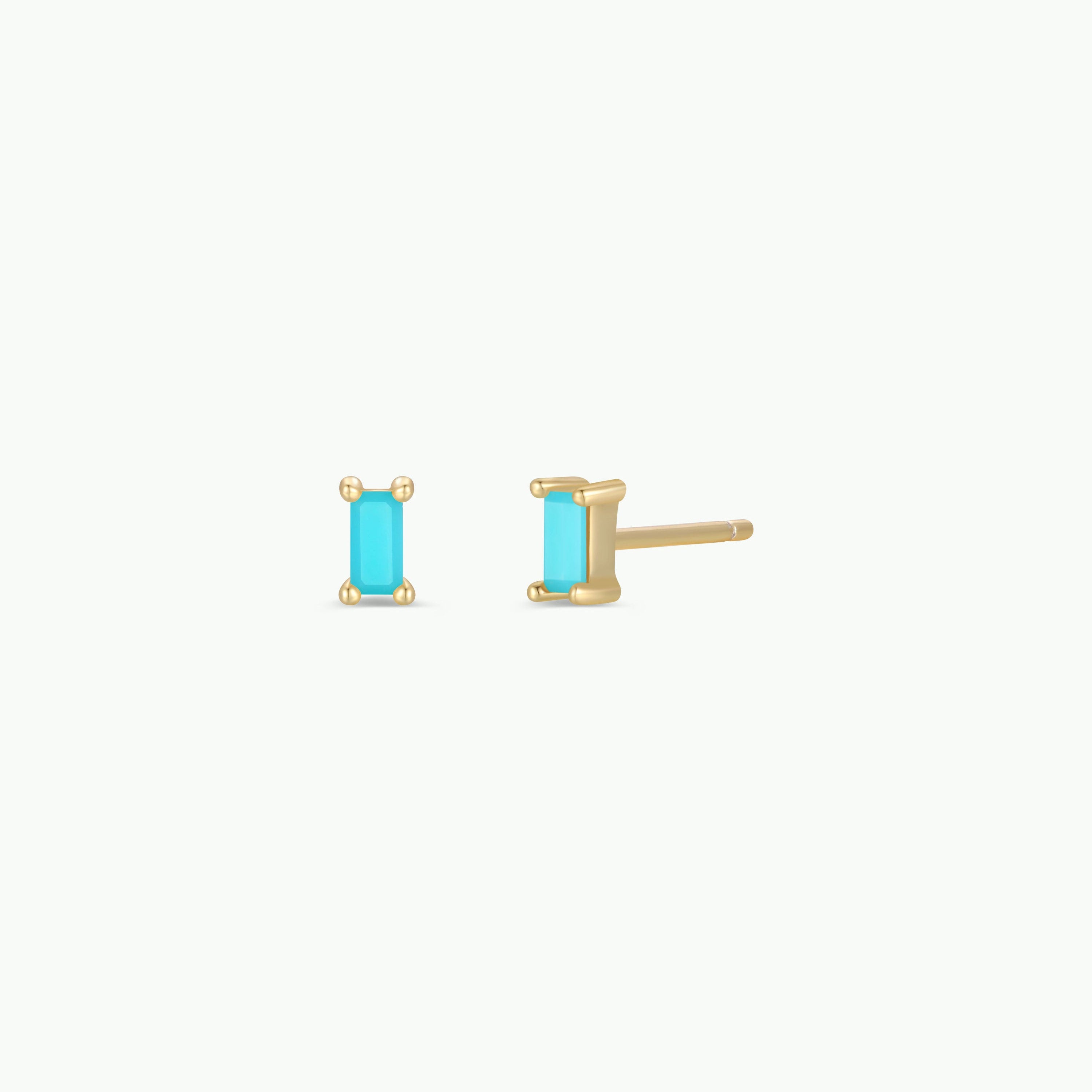 The Turquoise Baguette features small rectangular turquoise baguette stud earrings set in gold plating with sterling silver posts, displayed from the front and side on a plain white background.