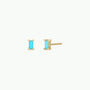 The Turquoise Baguette features small rectangular turquoise baguette stud earrings set in gold plating with sterling silver posts, displayed from the front and side on a plain white background.