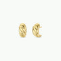 The Gold Swirl Hoop earrings, featuring a twisted hoop design and gold plating, are displayed on a plain white background—one facing forward and one angled to show the side and post, offering modern style for any occasion.