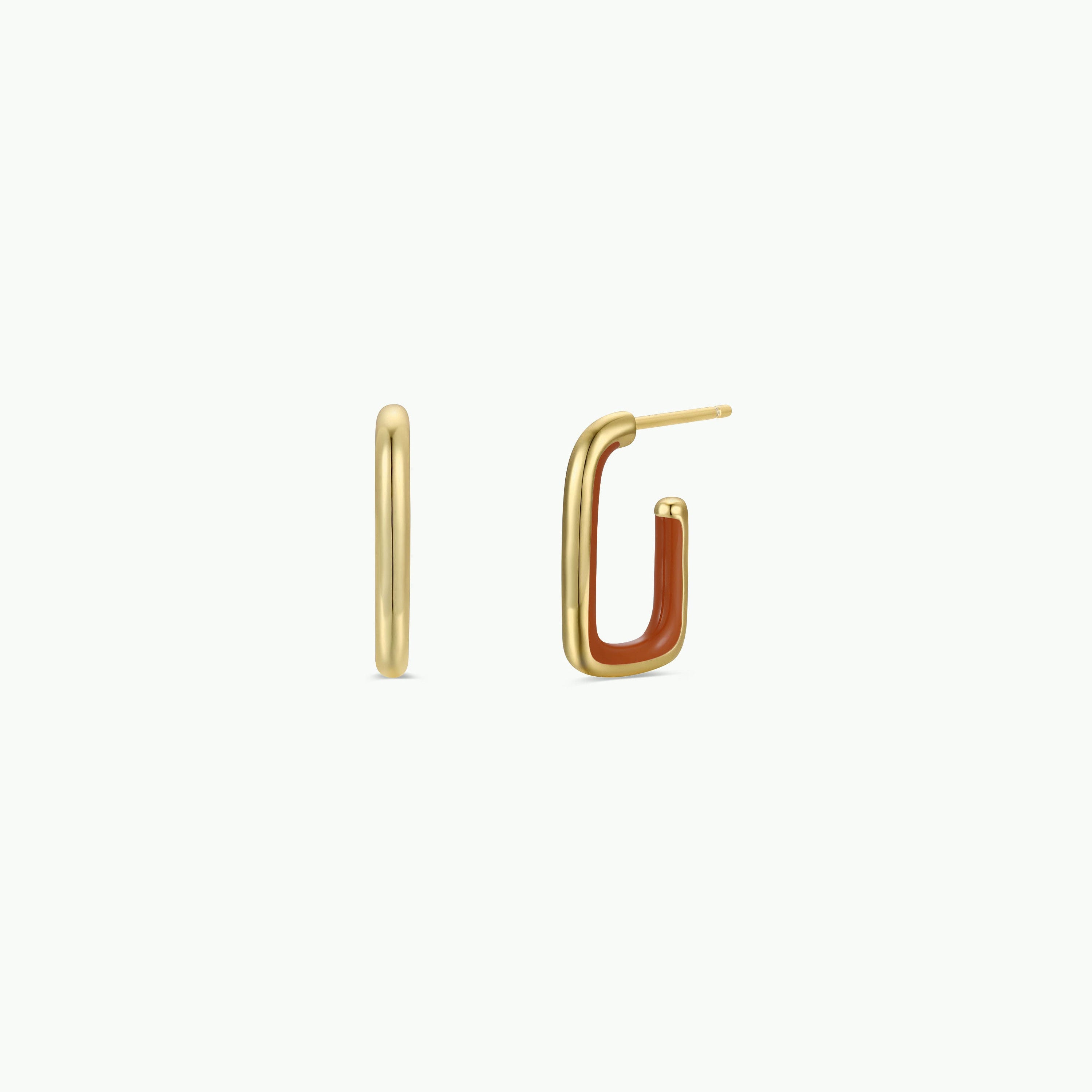The Brown Enamel Large Rectangle Gold Hoop Earrings feature a sleek 18k gold plated bar from the side, while the front view displays a rectangular frame with the lower half in hand-painted reddish-brown enamel.