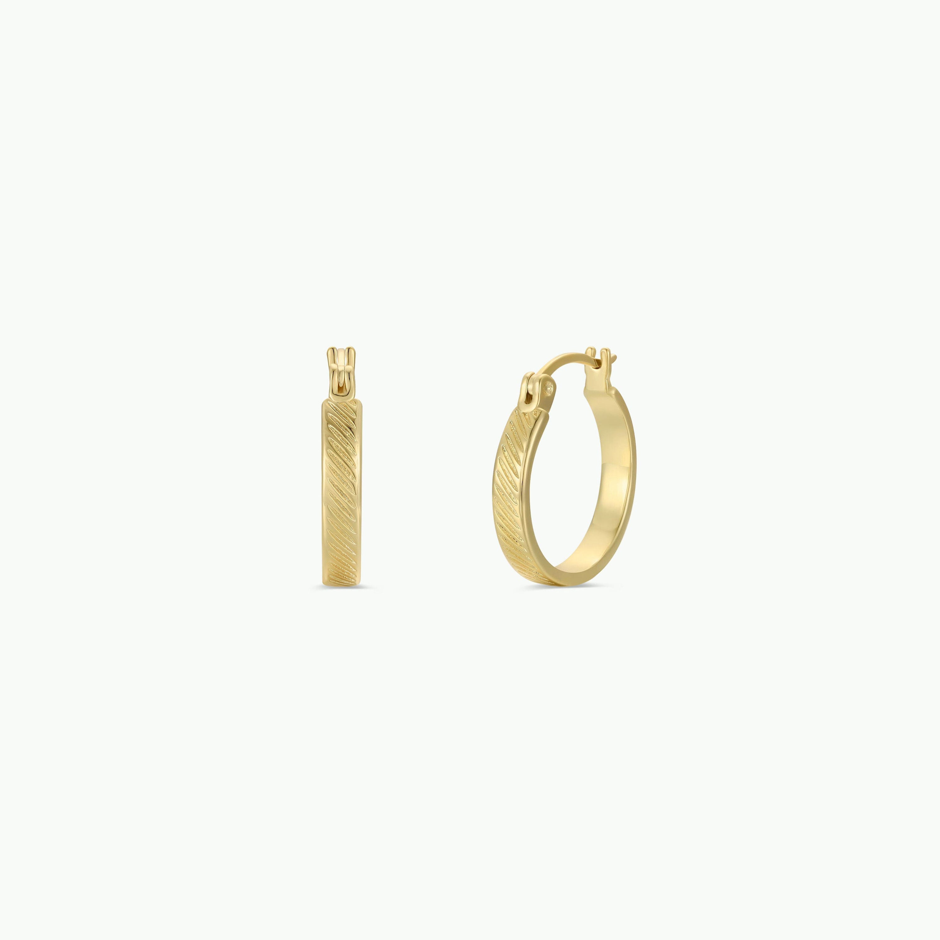 The Textured Hoop - Earring features a subtle diagonal etched pattern, 18k gold plating, and sterling silver posts, displayed from the side and front on a plain white background.