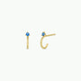 A pair of Open Mini Hoop Earrings - Blue Sapphire, plated in 18K gold and adorned with small sapphire CZ stones at the top, shown on a plain white background.