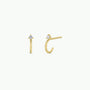 Open Mini Hoop Earring - White: A pair of small gold-plated hoop earrings with a clear round gemstone in a three-prong setting, displayed from front and side views against a plain white background.