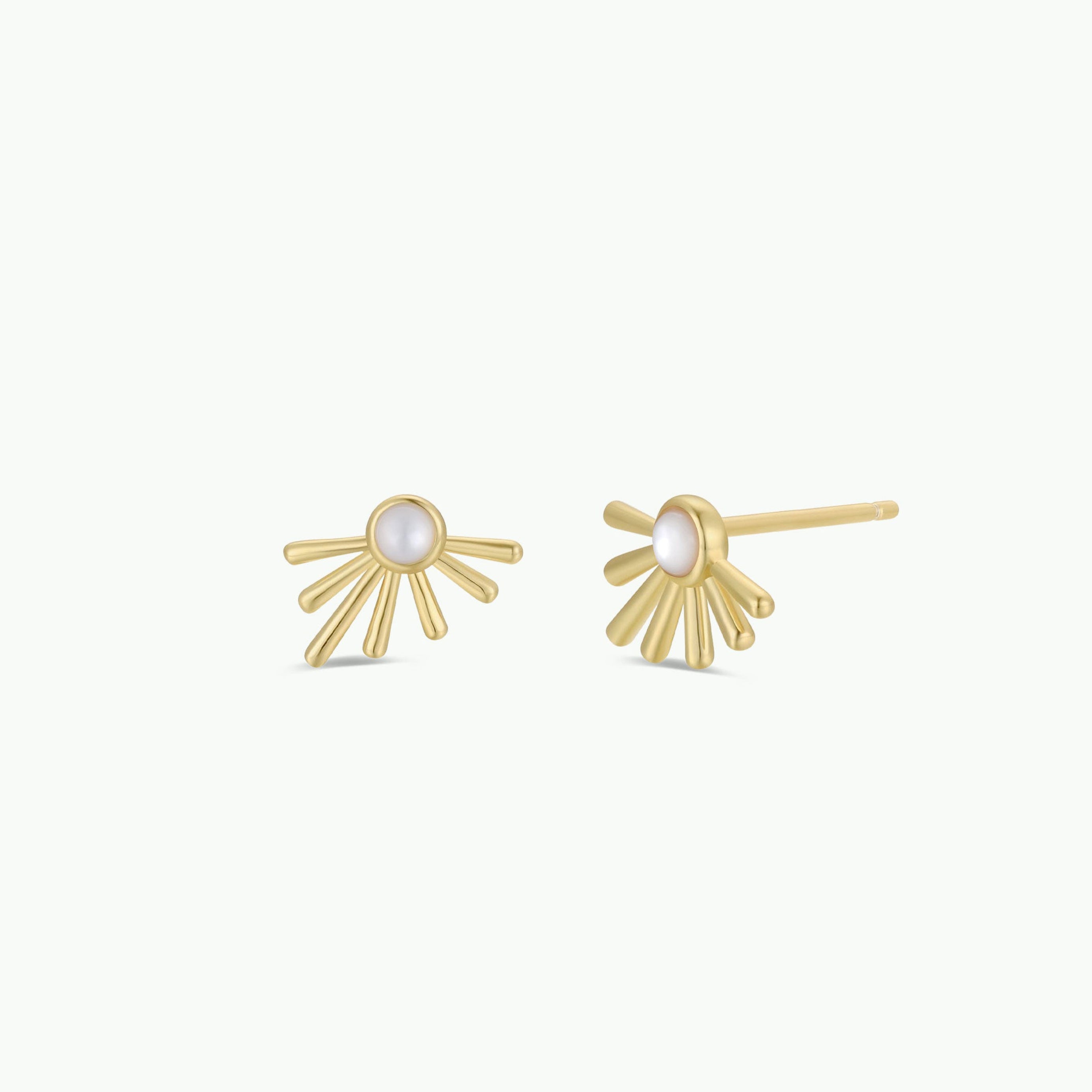JaxKelly's Sun Ray - Mother of Pearl gold plated stud earrings feature a central round mother-of-pearl and radiating gold bars in a sunburst design, shown on a plain white background.