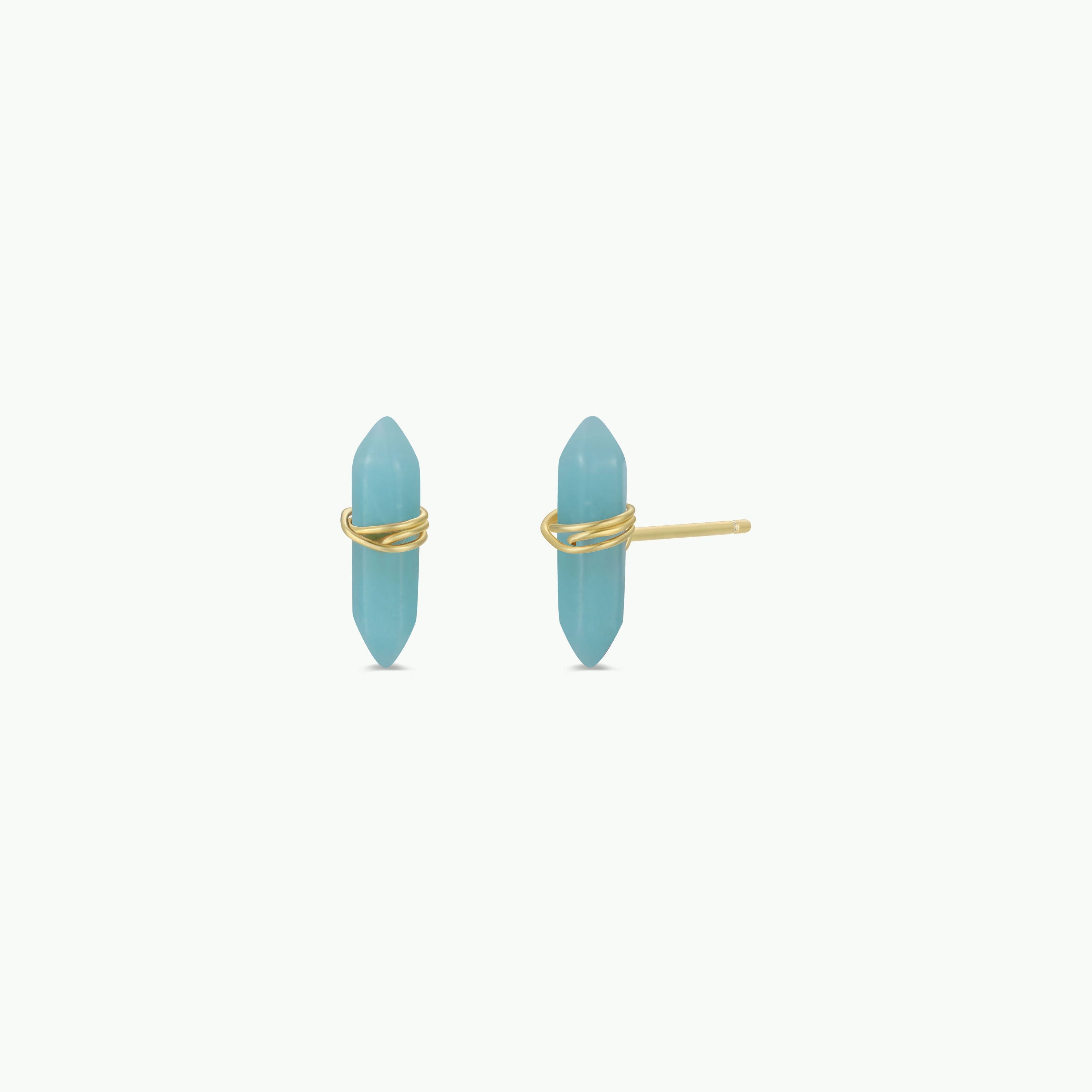 A pair of Amazonite Mineral Point - Hope stud earrings with vertical turquoise crystals wrapped in gold wire on sterling silver posts, displayed on a white background. One earring shows the front; the other shows the side with visible post.