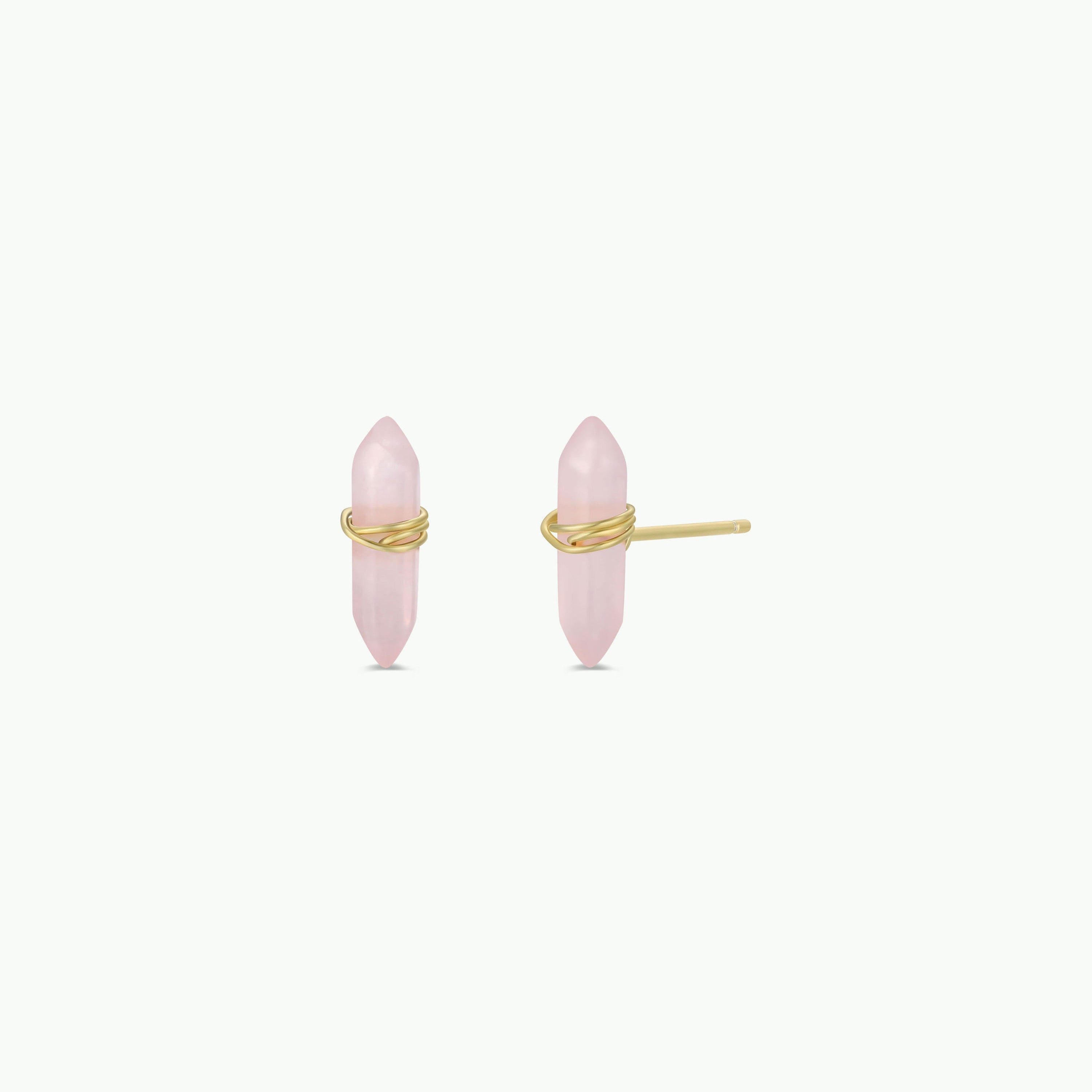 A pair of Rose Quartz Mineral Point - Love earrings, featuring pink crystal points wrapped with thin gold wire and 18k gold-plated posts, displayed on a plain white background.