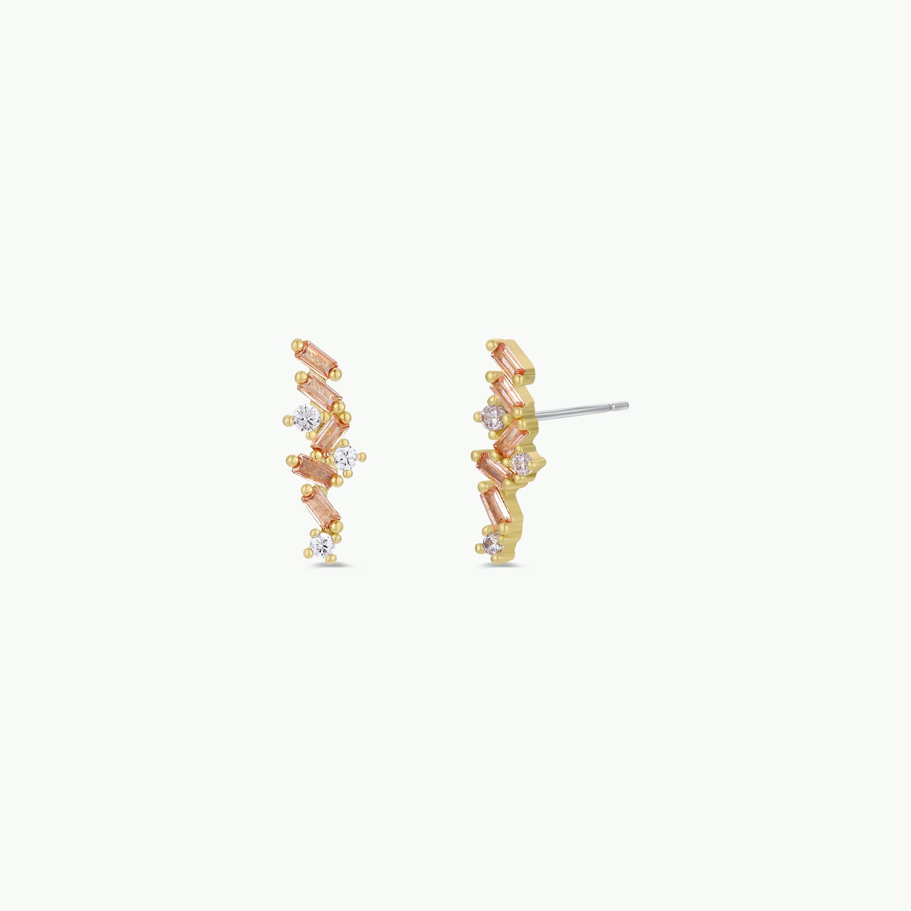 Cascading Baguette Drop - Gold Earrings: gold-plated zigzag studs with pink and clear CZ stones, shown on a plain white background.