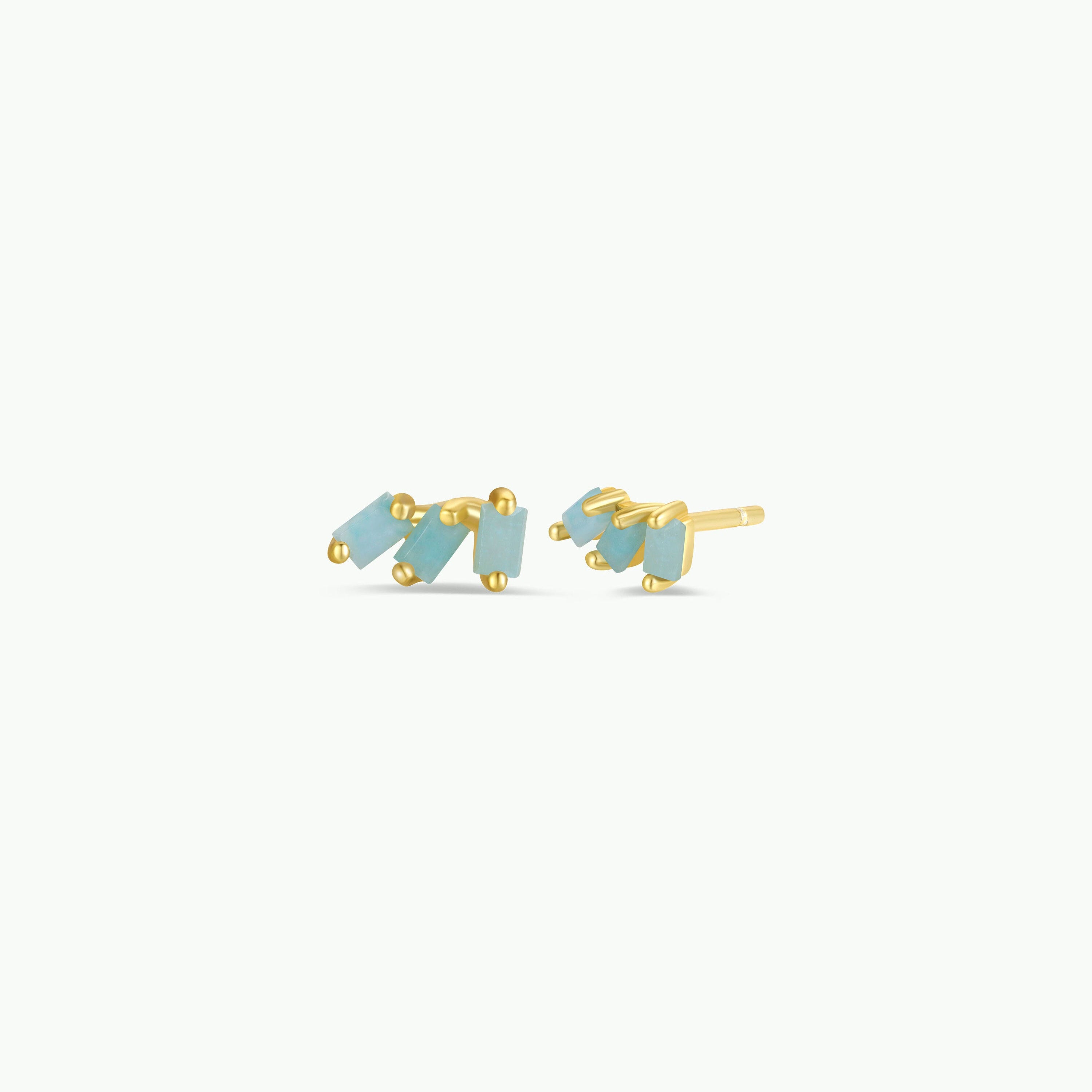 The Offset Trio - Amazonite are 18k gold plated stud earrings featuring three small rectangular amazonite stones on each, set in a staggered modern design with sterling silver posts, shown against a light background.