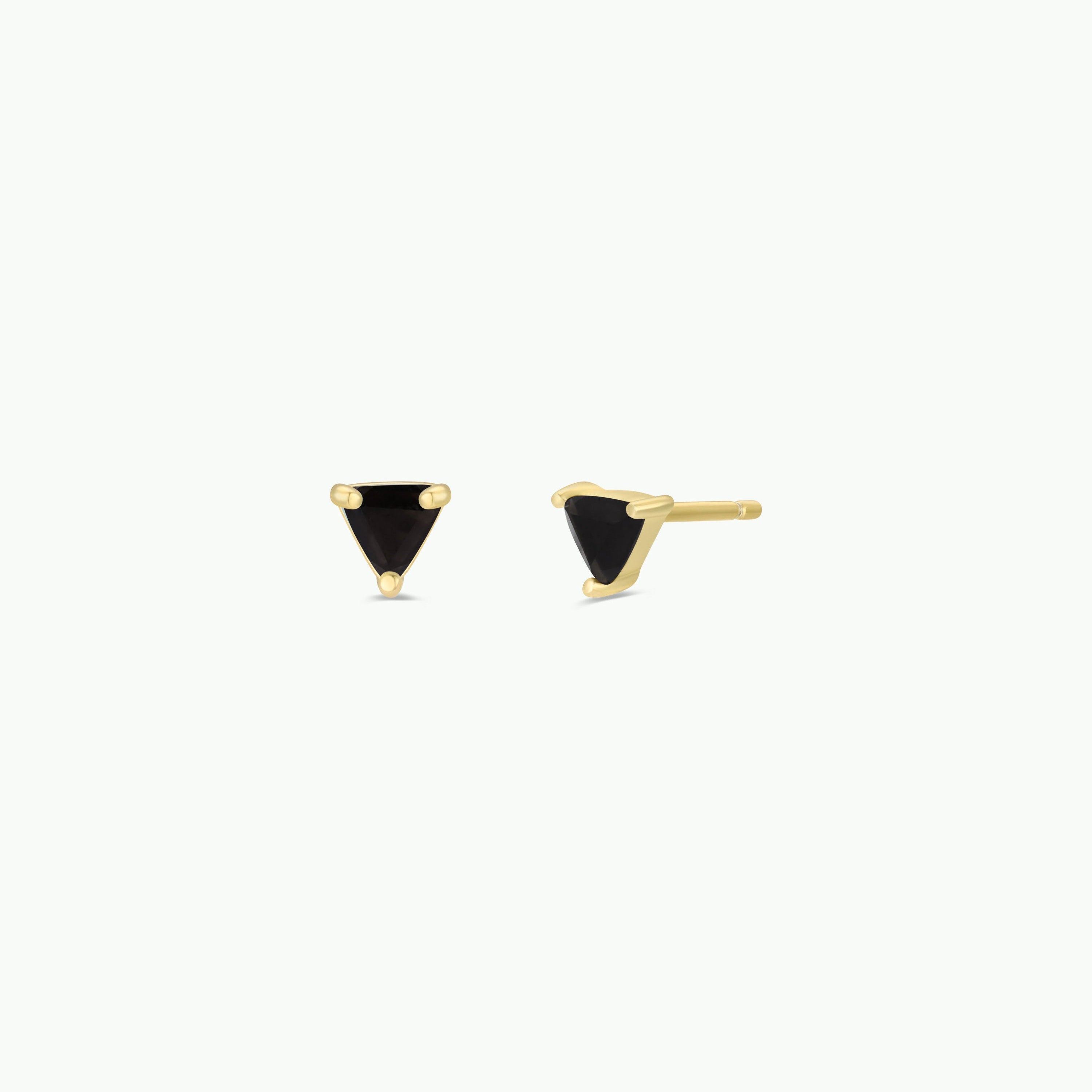 Black Tourmaline Mini Energy Gems - Strength: A pair of studs with black triangular gemstones set in 18k gold plating and sterling silver posts, shown on a plain white background.