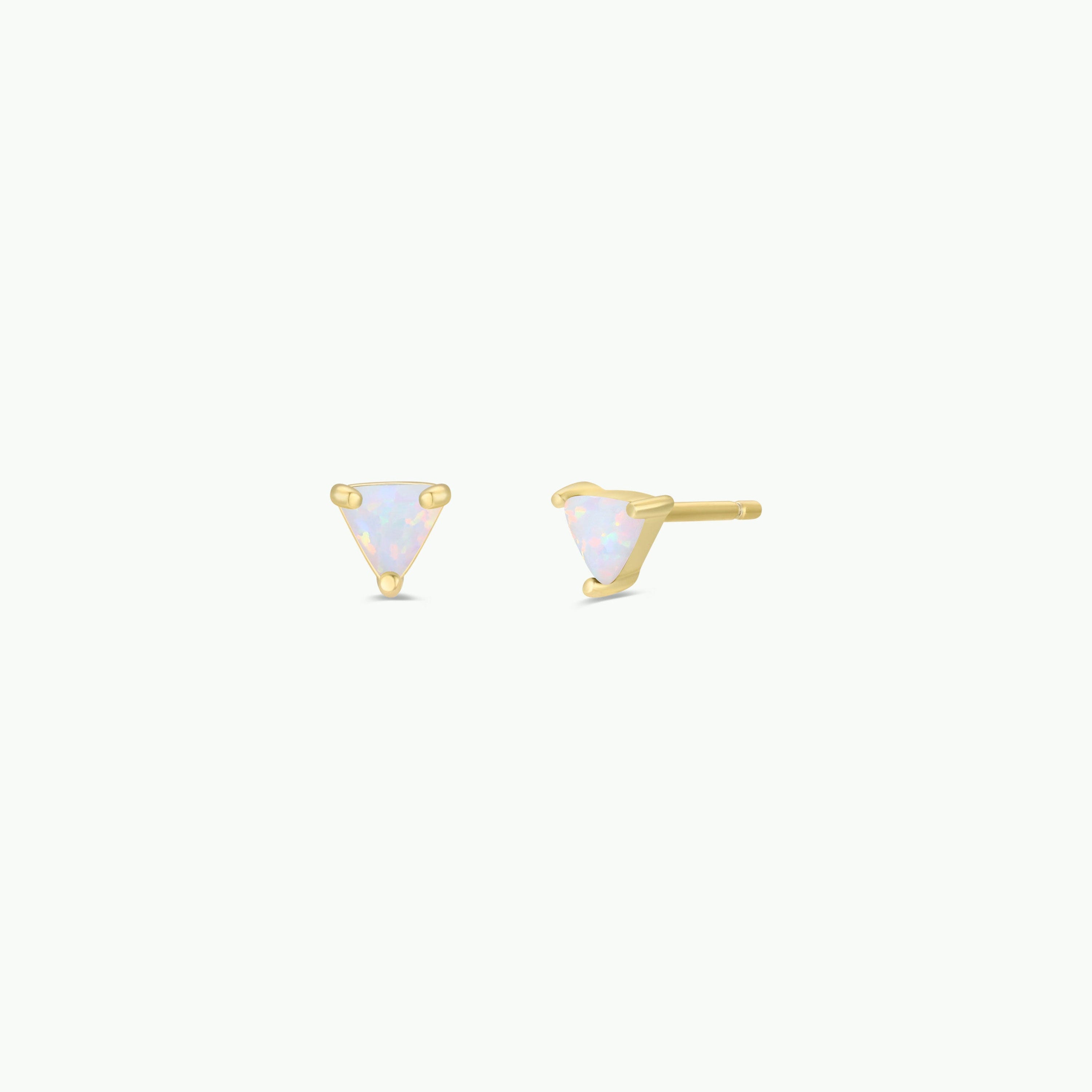 The White Opal Mini Energy Gems - Joy are lab-grown white opal studs in delicate triangular settings with 18k gold plating, shown from the front and side on a plain white background.