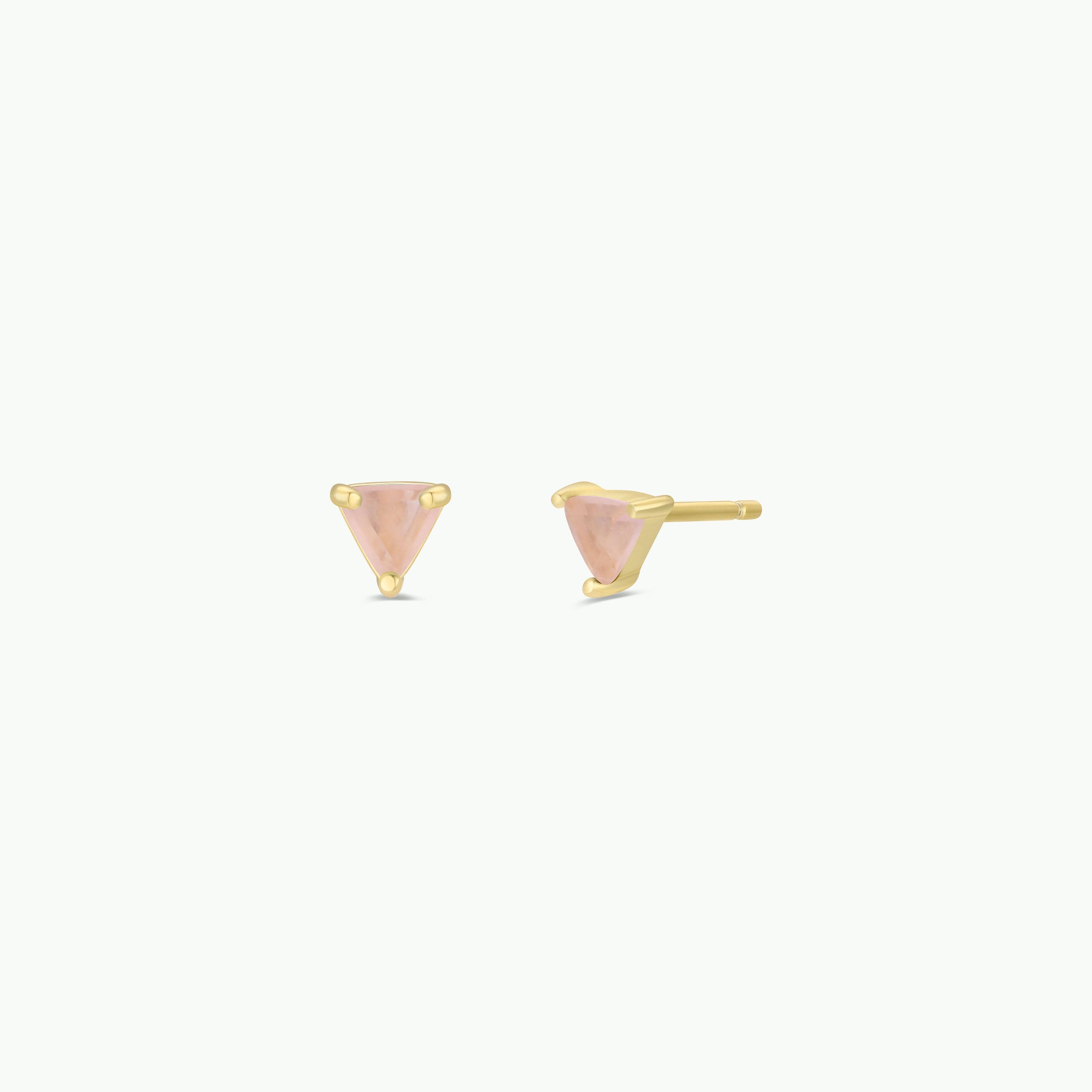 A pair of Rose Quartz Mini Energy Gems - Love gold stud earrings with small triangular pink gemstones and sterling silver posts, shown on a plain white background.