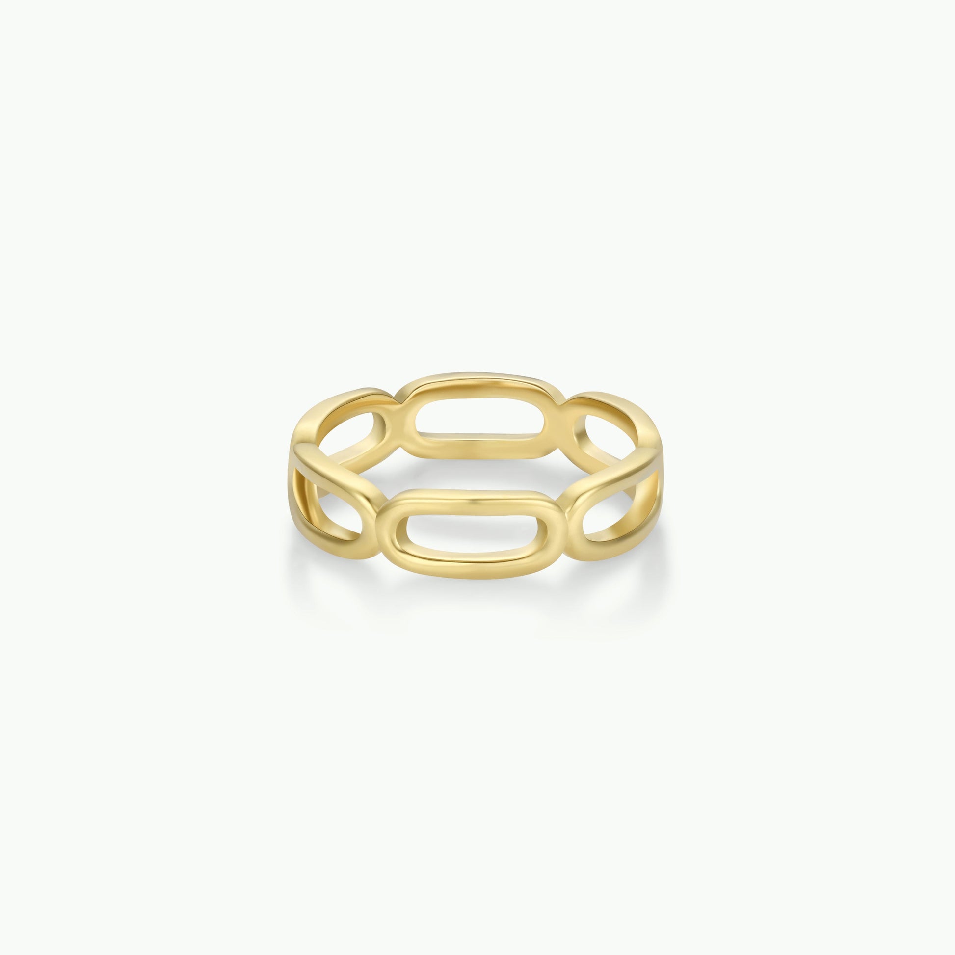 The Chain Link Gold Ring features an open-link design with elongated oval links, ideal for stacking and shown on a plain white background.