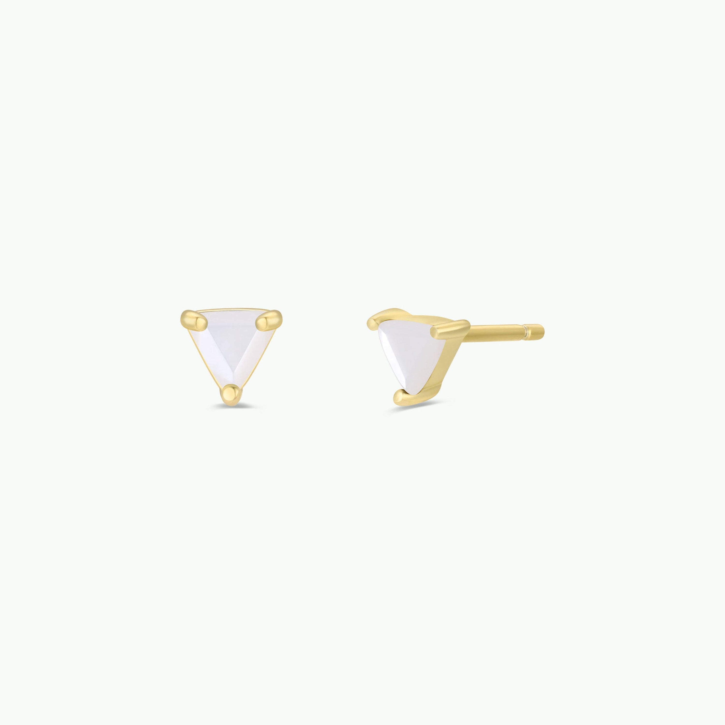 A pair of 18k gold plated stud earrings featuring small, triangular Mother of Pearl gemstones in three-prong settings—Mother of Pearl Mini Energy Gems - Calming—displayed on a white background.