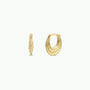 The Triple Arch Hoop - Earring features sculpted gold triple arch hoops, displayed from both side and front angles on a plain white background, highlighting its retro modern jewelry style.
