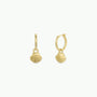 Seashell Hoop Earring: Small gold hoops with dangling seashell charms and sterling silver posts, shown on a plain white background.
