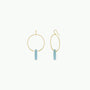 The Amazonite Hoop - Hope features gold plated hoops with a single vertical light blue amazonite crystal point pendant hanging from the center, displayed on a plain white background.