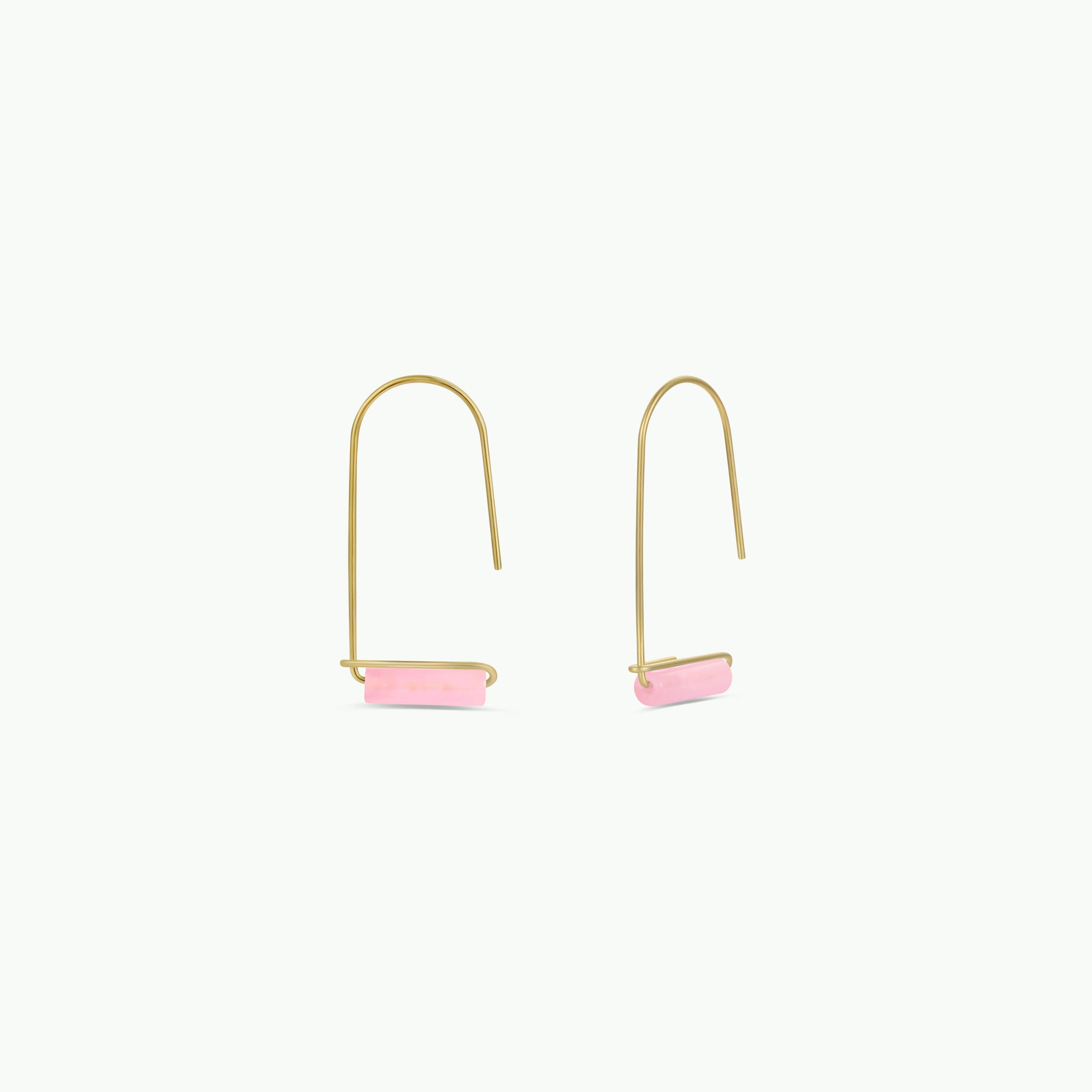 The Rose Quartz Gemstone Drop - Love earrings feature minimalist 18k gold plating and rectangular pink stone accents, showcased on a plain white background.