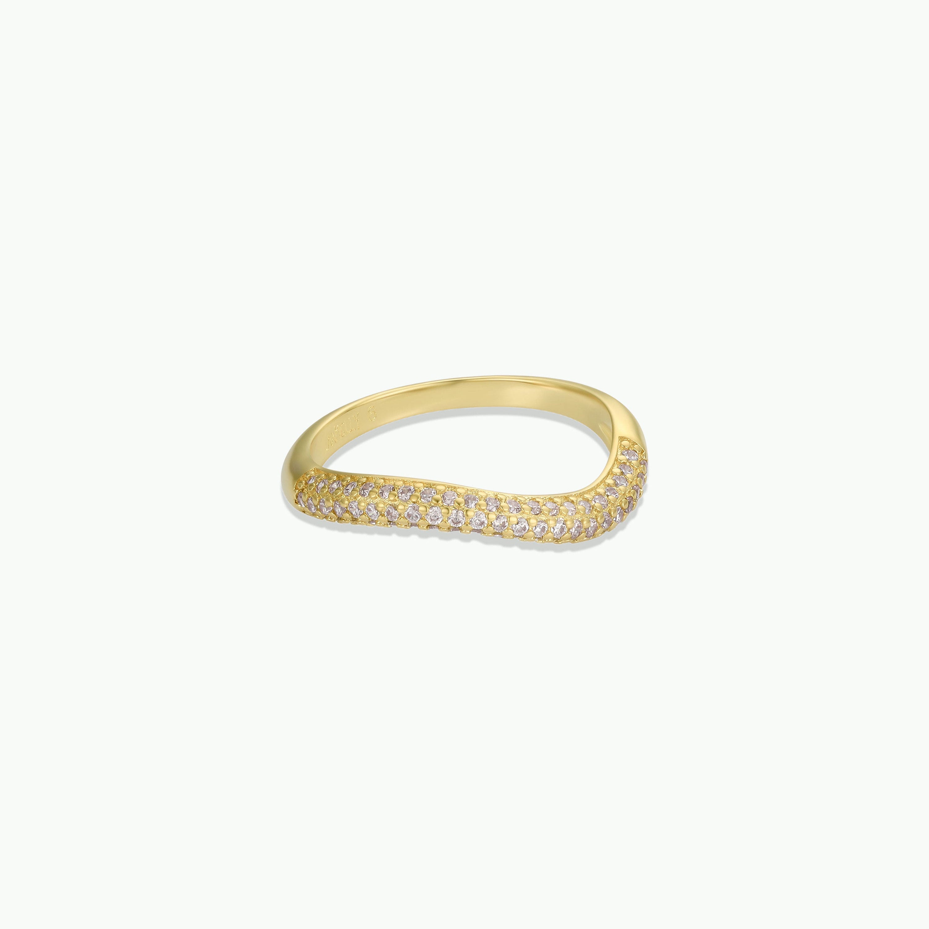 The Ring - Pave Wave - Champagne CZ features three rows of sparkling champagne cubic zirconia set in a gentle wave design with 18k gold plating, displayed on a plain white background.